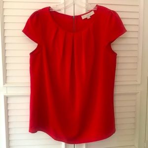 LOFT red cap sleeve blouse. Size Large. Tags off but never worn. Zipper in back.